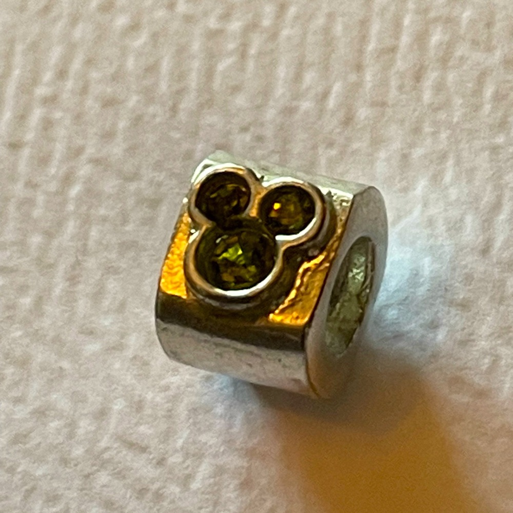 Authentic Chamilia Disney Mickey Spacer with green cz